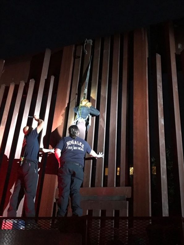 Human smugglers leave woman dangling from US/Mexico border fence in Nogales, Arizona, on Saturday. Border Patrol officers along with Nogales Fire Department were successfully able to get the woman down unharmed. Credit: US Customs and Border Patrol https://twitter.com/CBPArizona/status/884573425125208064 CNN Images: Full press release: https://www.cbp.gov/newsroom/local-media-release/smugglers-leave-mexican-woman-dangling-fence Smugglers Leave Mexican Woman Dangling from Fence Release Date: July 10, 2017 TUCSON, Ariz.  U.S. Border Patrol agents in Nogales found a 37-year-old Mexican woman precariously dangling from the international border fence Saturday, abandoned by smugglers. Agents patrolling the border east of Nogales witnessed two smugglers attempting to lower the woman into the United States from Mexico using a harness and hoist rope. When agents approached, the woman attempted to climb back over the fence into Mexico but the smugglers left her hanging. Responding agents found the woman suspended approximately 15 feet above the ground and called the Nogales Fire Department to get her down. The woman was uninjured and is now being processed for immigration violations.