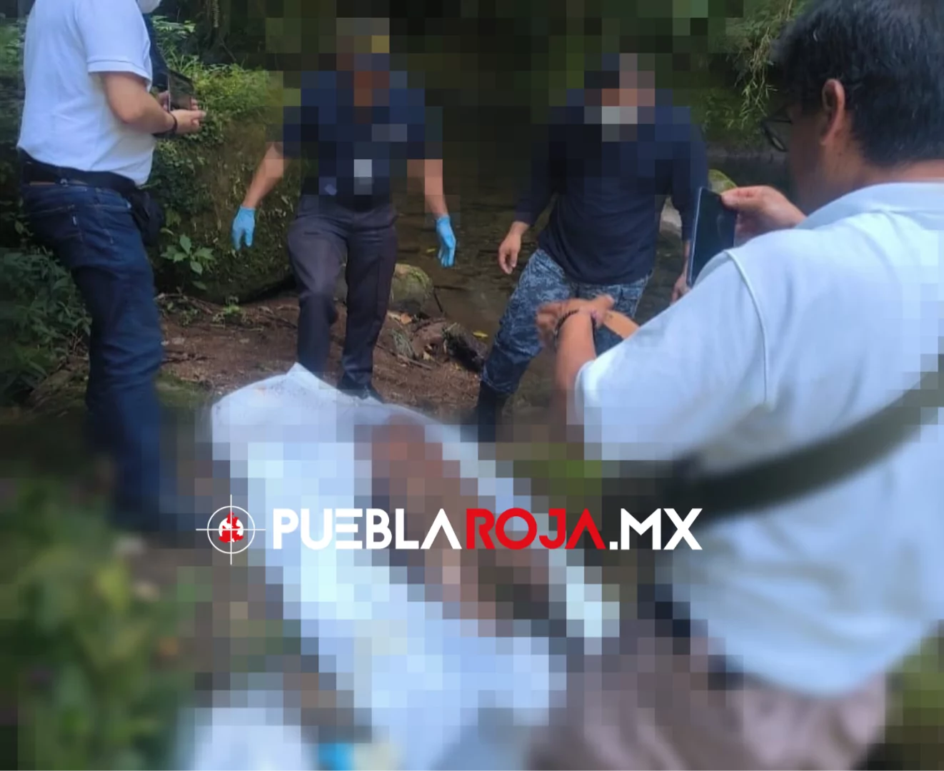Hallan cadáver en poza de agua en Hueytamalco; estaba en descomposición